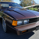 Illustration for article titled For $6,500 — top down and brown, loaded up and Datsun